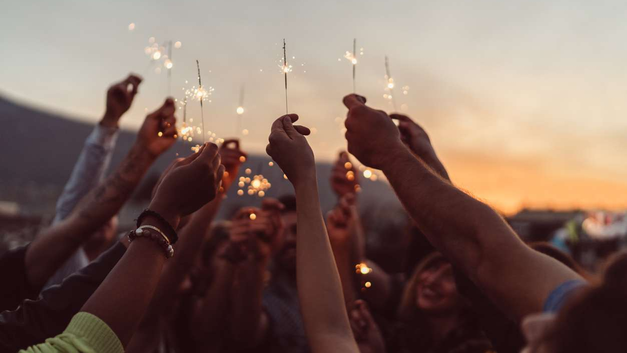 Friends celebrating New Year on the rooftop